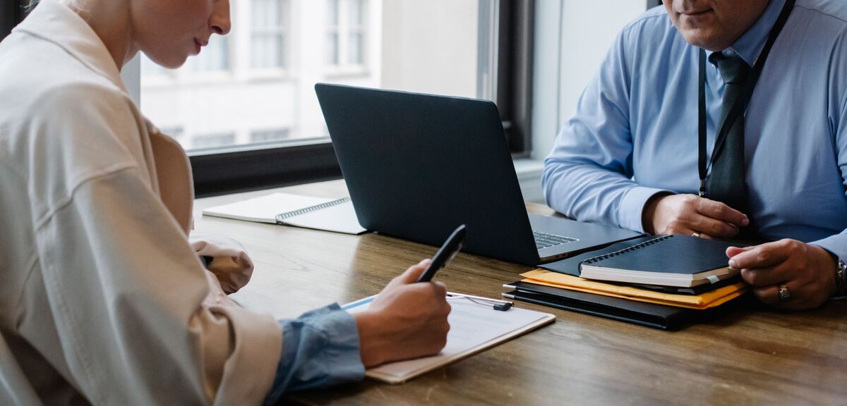 Client preparing immigrant visa documents for a consular interview with legal guidance